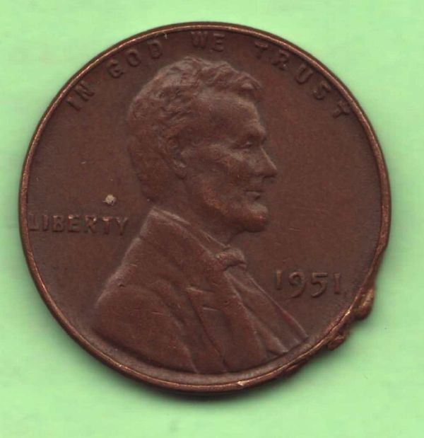 Odd-Damage-On-A-1909-S-VDB-Penny